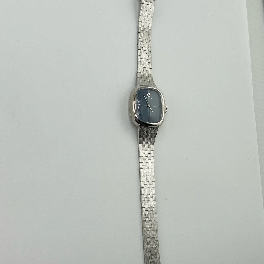 Milus vintage unisex Silver and Blue swiss made watch #566